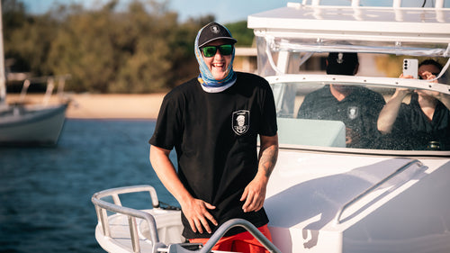 Black Ops Cap worn on a Makocraft boat
