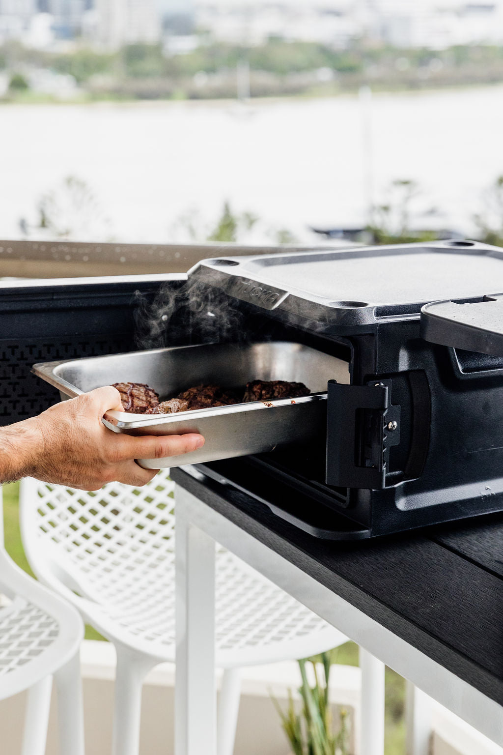 Junior Sous in Black with hot steak tray sliding out